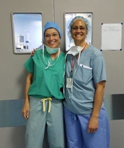 Dr. Pinkerton and her colleague outside of the Operating Room